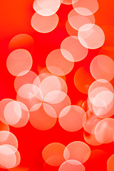 Image showing Abstract background. Blurred colorful circles bokeh orange toned