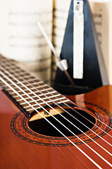 Image showing Strings of a guitar and the note