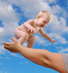 Image showing toddler boy smiling in the sky