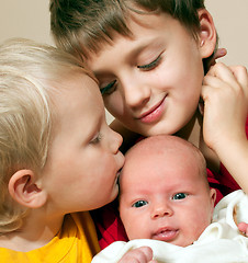 Image showing two brothers and baby sister