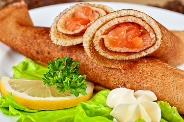 Image showing Pancakes with salmon