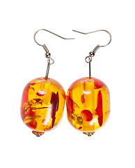 Image showing Earrings in glass yellow- red  on a white background