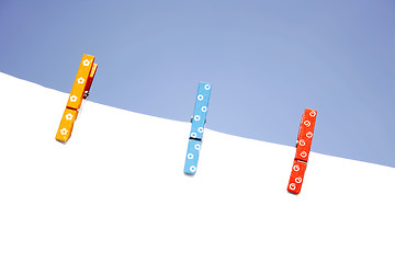 Image showing Colorful wooden pegs