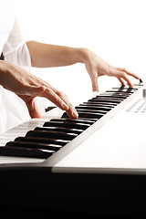 Image showing Playing piano