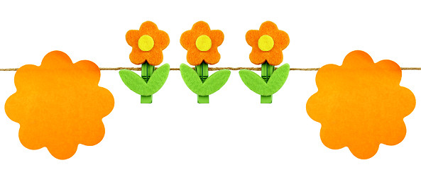 Image showing Orange post it and flowers