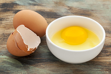 Image showing broken egg in a bowl