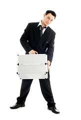 Image showing businessman with metal container