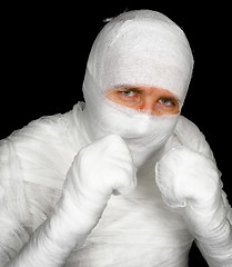 Image showing Completely bandaged man is ready to fight