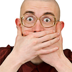 Image showing Emotional excited man  keep his mouth closed