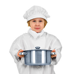 Image showing Young cook. Small girl in white suit with saucepan