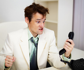 Image showing Very angry businessman in office