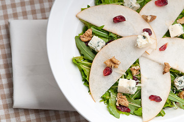 Image showing Fresh pears arugula gorgonzola cheese salad