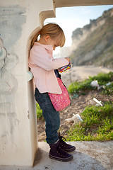 Image showing Young girl in archway