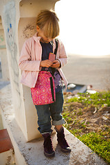 Image showing Young girl in archway