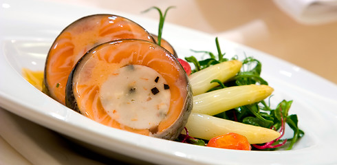 Image showing Atlantic Salmon around a scallop