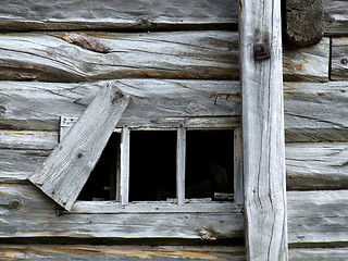 Image showing Old small window in wooden house