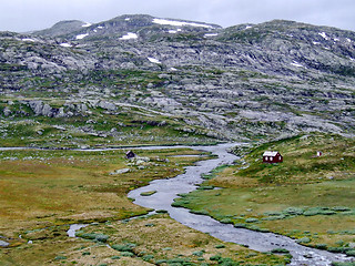 Image showing Small house by the river