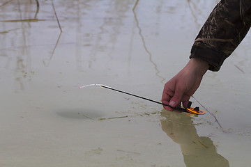 Image showing spring fishing on collapsing ice