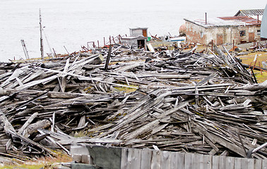 Image showing the thrown logs and boards