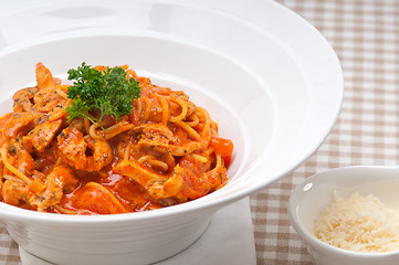 Image showing Italian spaghetti pasta with tomato and chicken