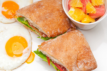 Image showing ciabatta panini sandwich eggs tomato lettuce