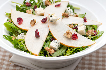 Image showing Fresh pears arugula gorgonzola cheese salad