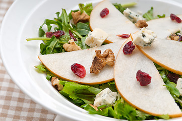 Image showing Fresh pears arugula gorgonzola cheese salad