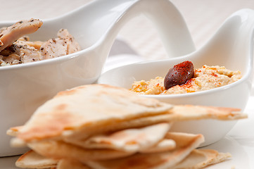 Image showing chicken taboulii couscous with hummus