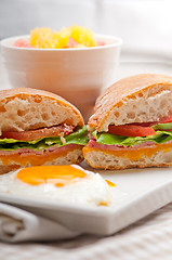 Image showing ciabatta panini sandwich eggs tomato lettuce