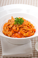 Image showing Italian spaghetti pasta with tomato and chicken