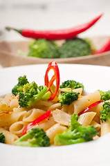 Image showing Italian penne pasta with broccoli and chili pepper