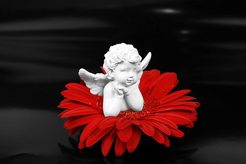 Image showing Angel and a flower