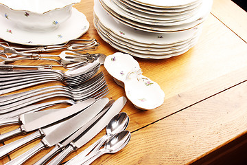 Image showing Dishes and cutlery set