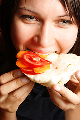 Image showing Woman eating a healthy sandwich 