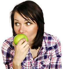 Image showing Girl eating an apple