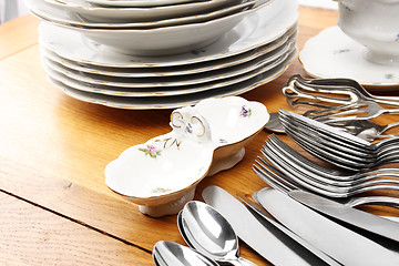 Image showing Dishes and cutlery set