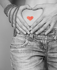 Image showing Woman making heart shape