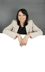 Image showing Woman with a blank billboard 