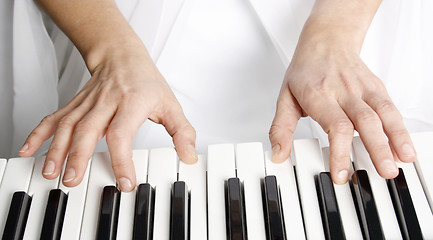 Image showing Woman playing piano