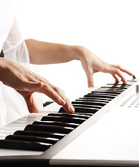 Image showing Playing piano