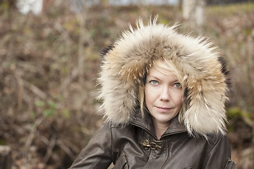 Image showing Blonde Woman with Beautiful Blue Eyes