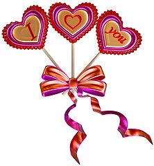 Image showing three lollipops tied with a bow with long ribbons