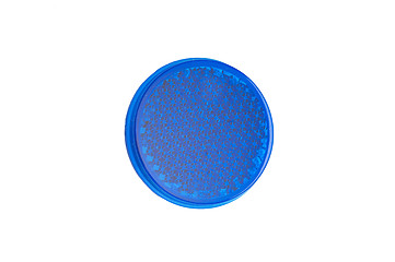 Image showing Round blue reflector isolated on white.