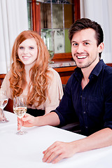 Image showing smiling happy people in restaurant