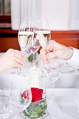 Image showing happy smiling couple in restaurant celebrate