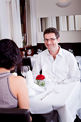 Image showing happy smiling couple in restaurant