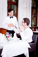 Image showing happy smiling couple in restaurant