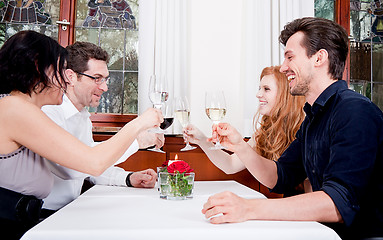 Image showing smiling happy people in restaurant