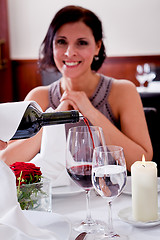 Image showing couple drinking red wine in restaurant