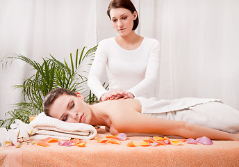 Image showing young attractive smilig woman doing wellness spa